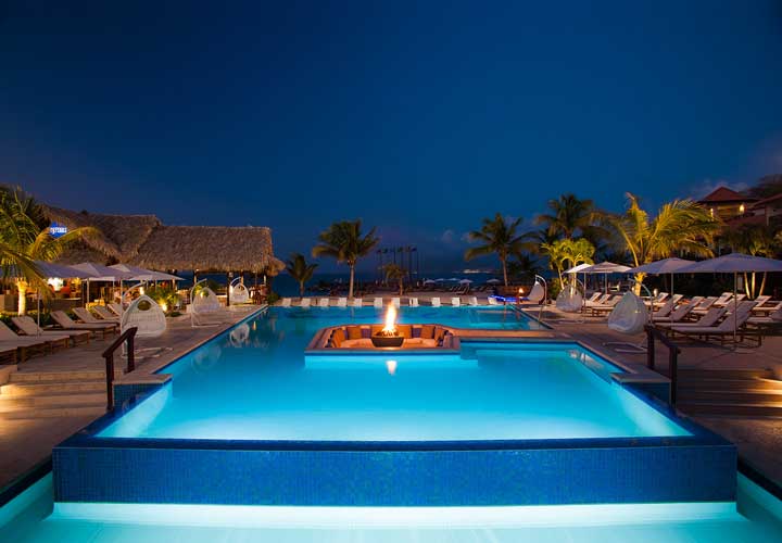 Sandals Pool with infiity edges and sunken seating with firepit - Saint George, Grenada
